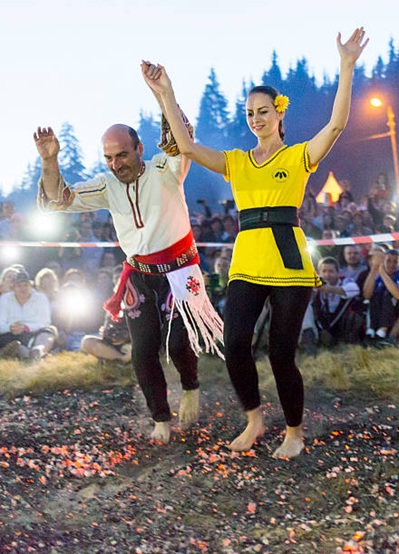 two people doing fire walking